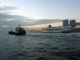 A_view_of_Victoria_Harbour_at_evening_with_vessels_of_all_shapes_and_sizes_traversing_it.jpg